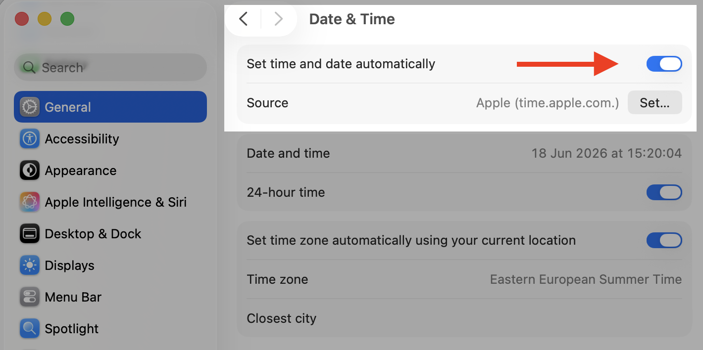 Date & Time pane in macOS Tahoe System Settings, turning on the Set time and date automatically toggle on a MacBook clock.