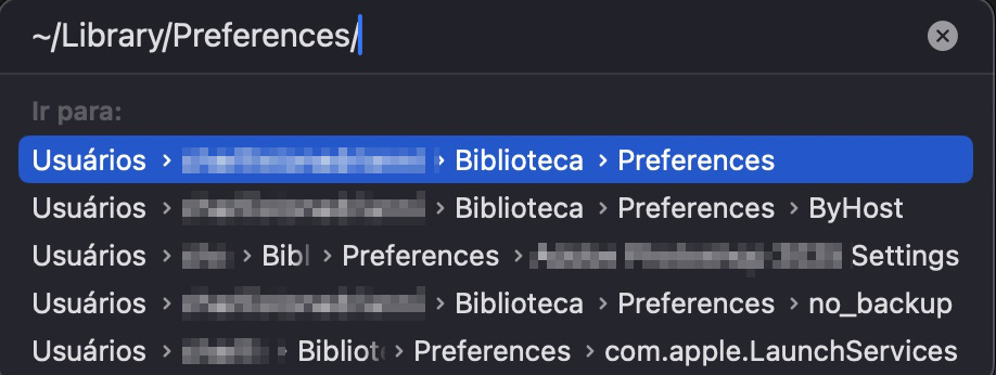 A janela Ir para a pasta no Finder de um Mac mostra um caminho de arquivo inserido. Como corrigir a Touch Bar no MacBook Pro: exclua os arquivos de cache.