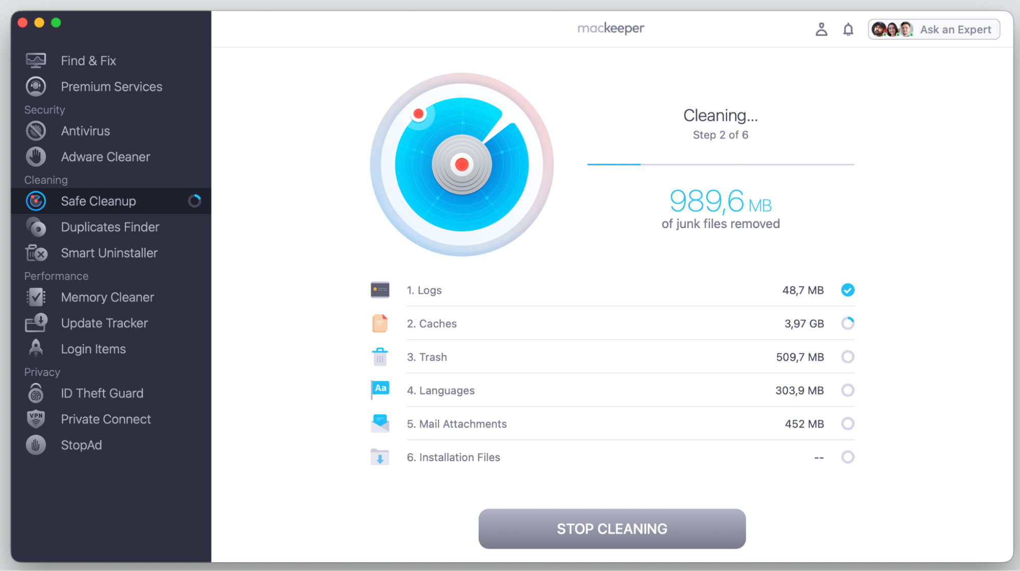 MacKeeper's Safe Cleanup progress screen on macOS Tahoe, removing junk files step by step to free storage on an Apple computer.