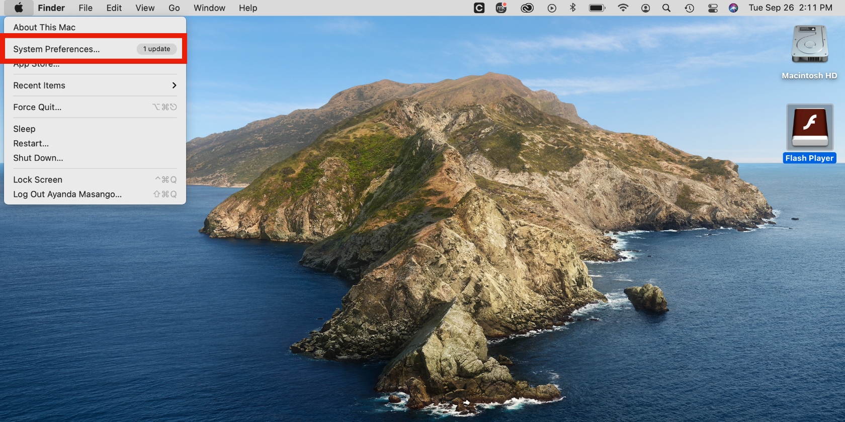 The Apple menu is opened on a Mac computer. Select System Preferences to start the process of removing Steam from System Preferences.