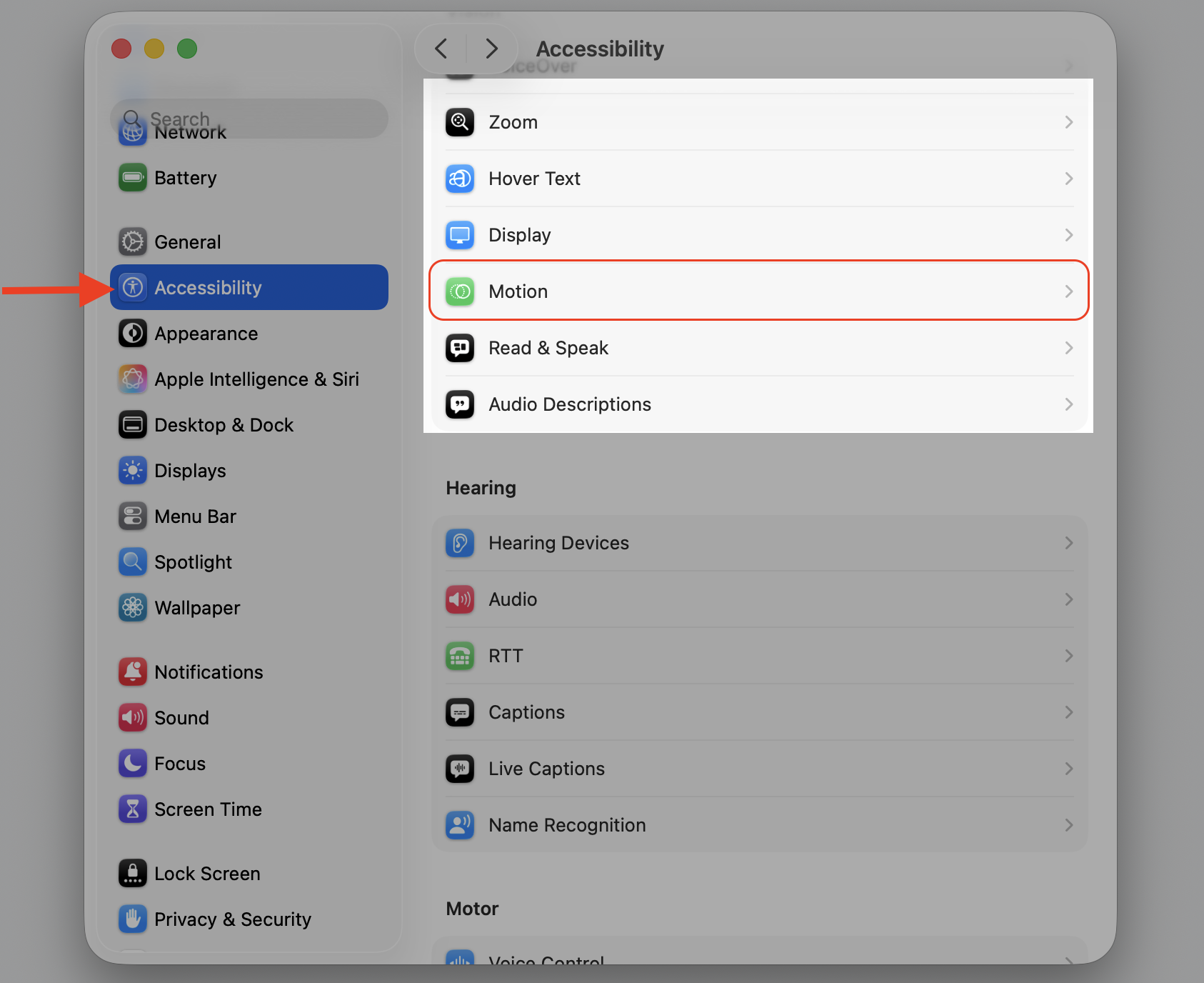 Accessibility pane in System Settings on a MacBook with the Motion option selected to further reduce visual load in macOS Tahoe.