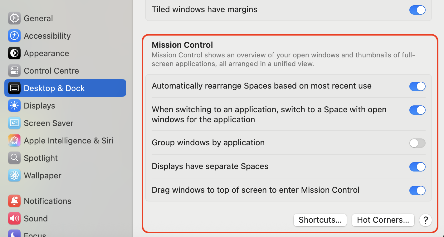 Scroll down within Desktop & Dock settings until you reach the Mission Control section to access features for managing spaces and window behavior.
