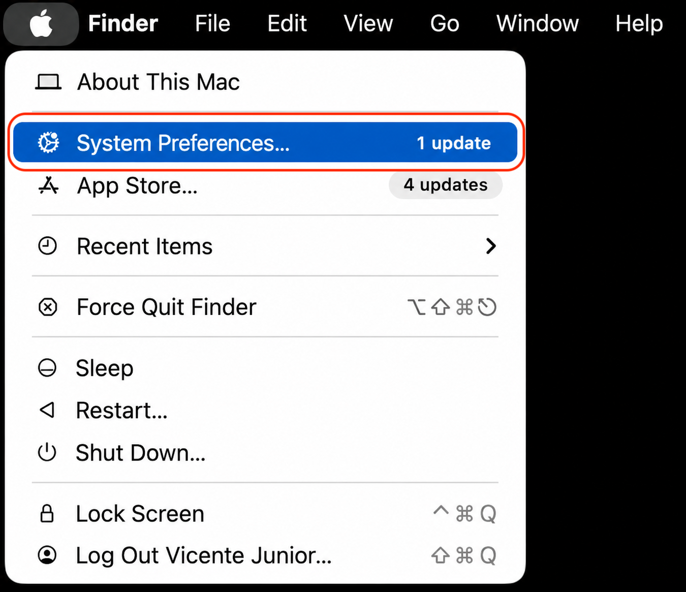 macOS Monterey Apple menu opened on an iMac to choose System Preferences before erasing all content and settings without a keyboard.