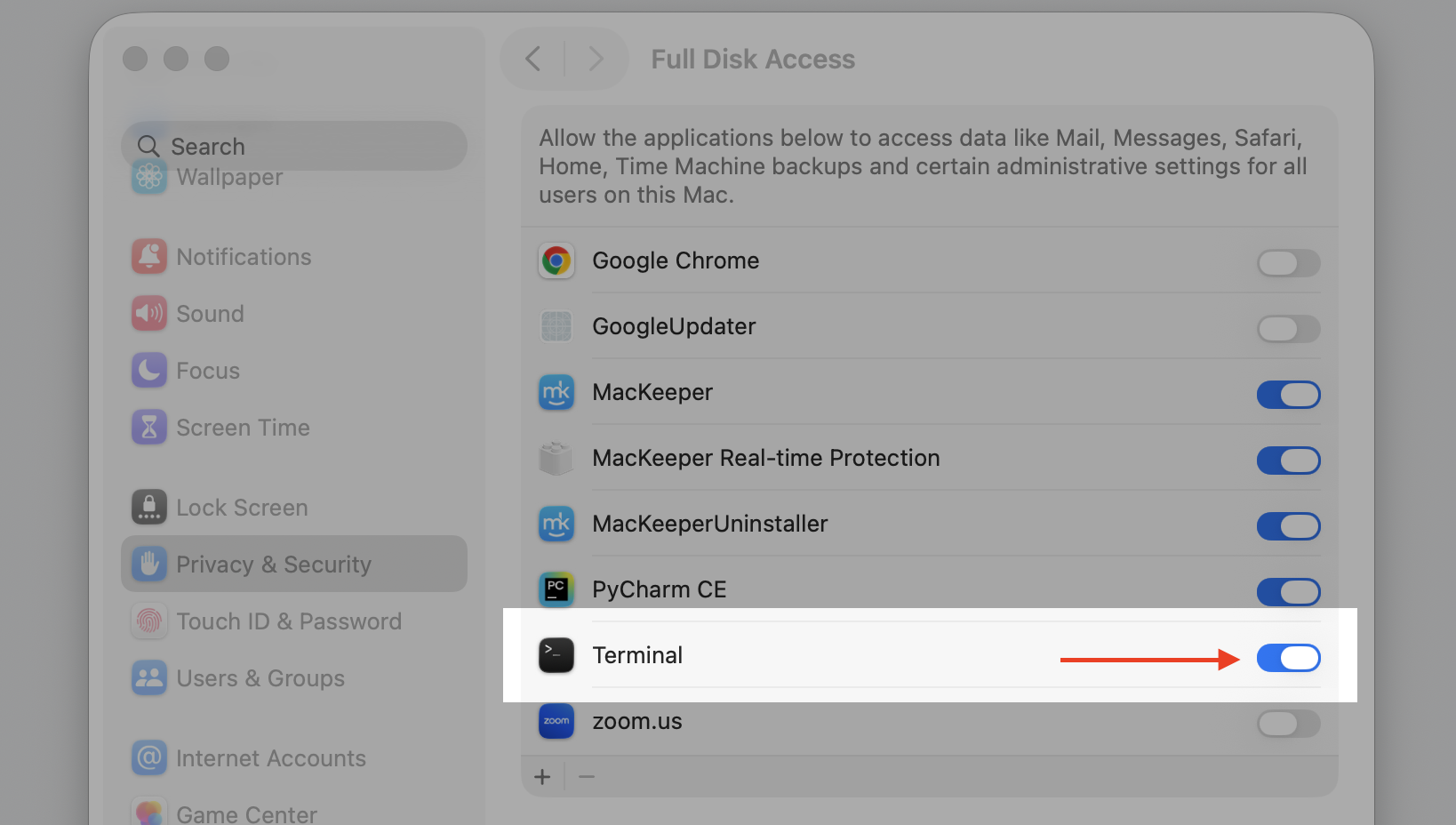 Full Disk Access list in System Settings on a MacBook with the toggle next to Terminal switched on to grant full disk access.