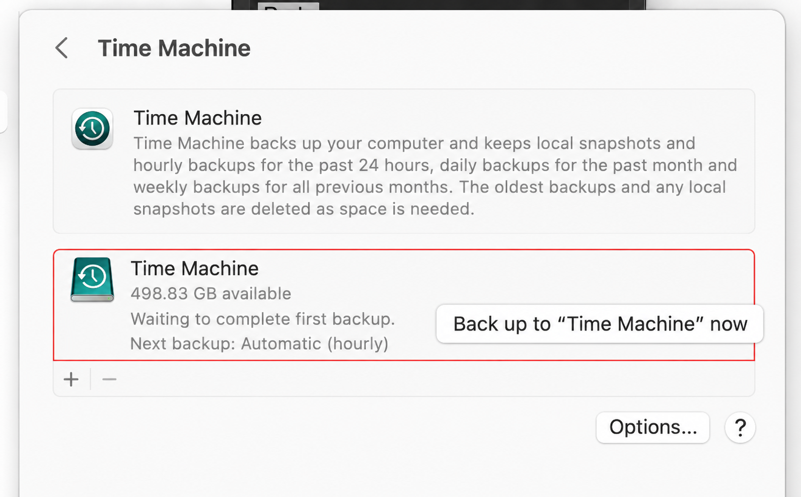 System Settings Time Machine pane on macOS Ventura showing Back Up Now while the first backup finishes on your Apple laptop.