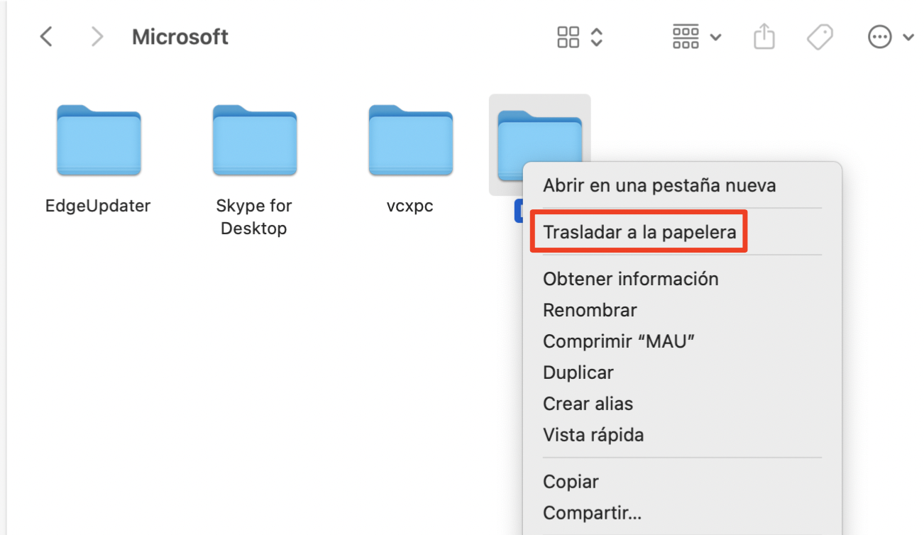 La carpeta MAU está seleccionada y la opción «Trasladar a la papelera» aparece resaltada en rojo en el Finder de un Mac, ya que el usuario está eliminando la carpeta.