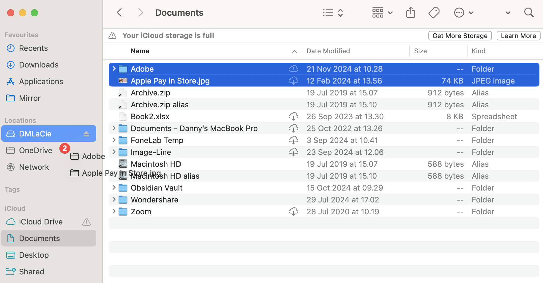 To move files from your Mac to an external hard drive, find the ones you wish to transfer within Finder. Once you've done this, drag and drop them into the location with your hard drive.