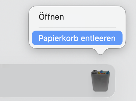 Teil des Docks auf einem Mac, mit ausgewähltem Papierkorb. Das Rechtsklick-Menü ist geöffnet und Papierkorb leeren ist ausgewählt.