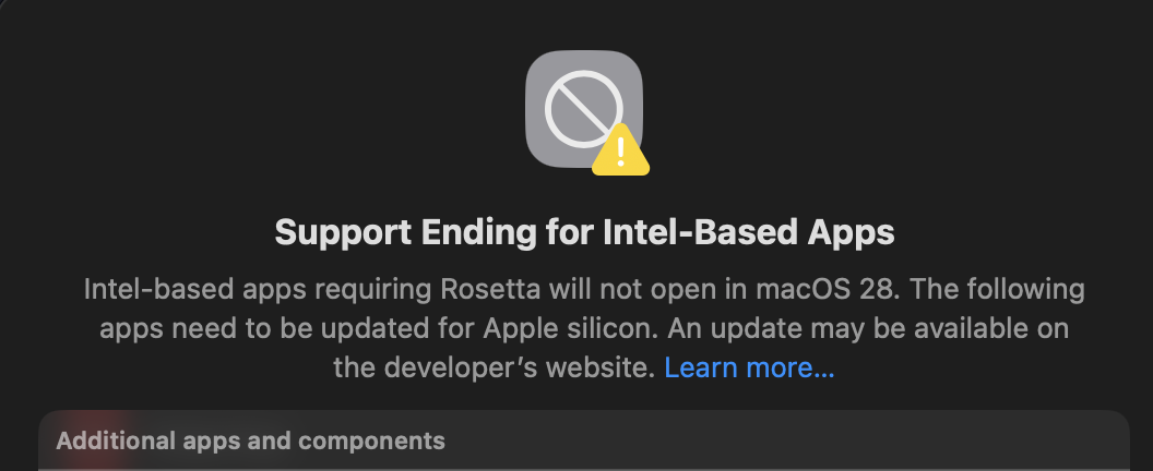 A macOS 28 notice on a MacBook warning that Intel-based apps needing Rosetta will not open and must be updated for Apple silicon.