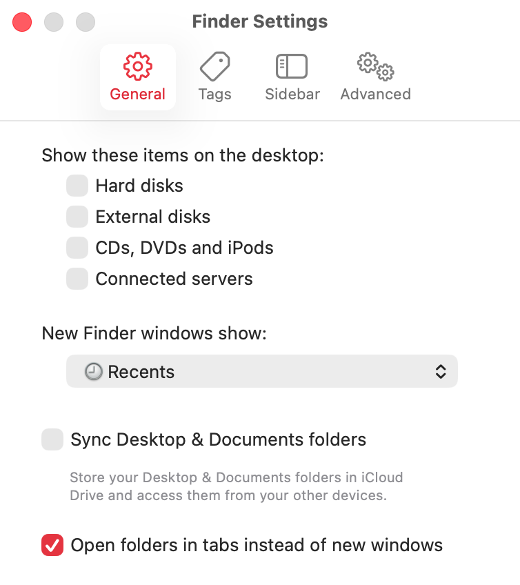 Now, open the 'General' tab. Under 'Show these items on the desktop', you'll see a list of items. Untick items that you want to hide, including hard disks and internal disks.