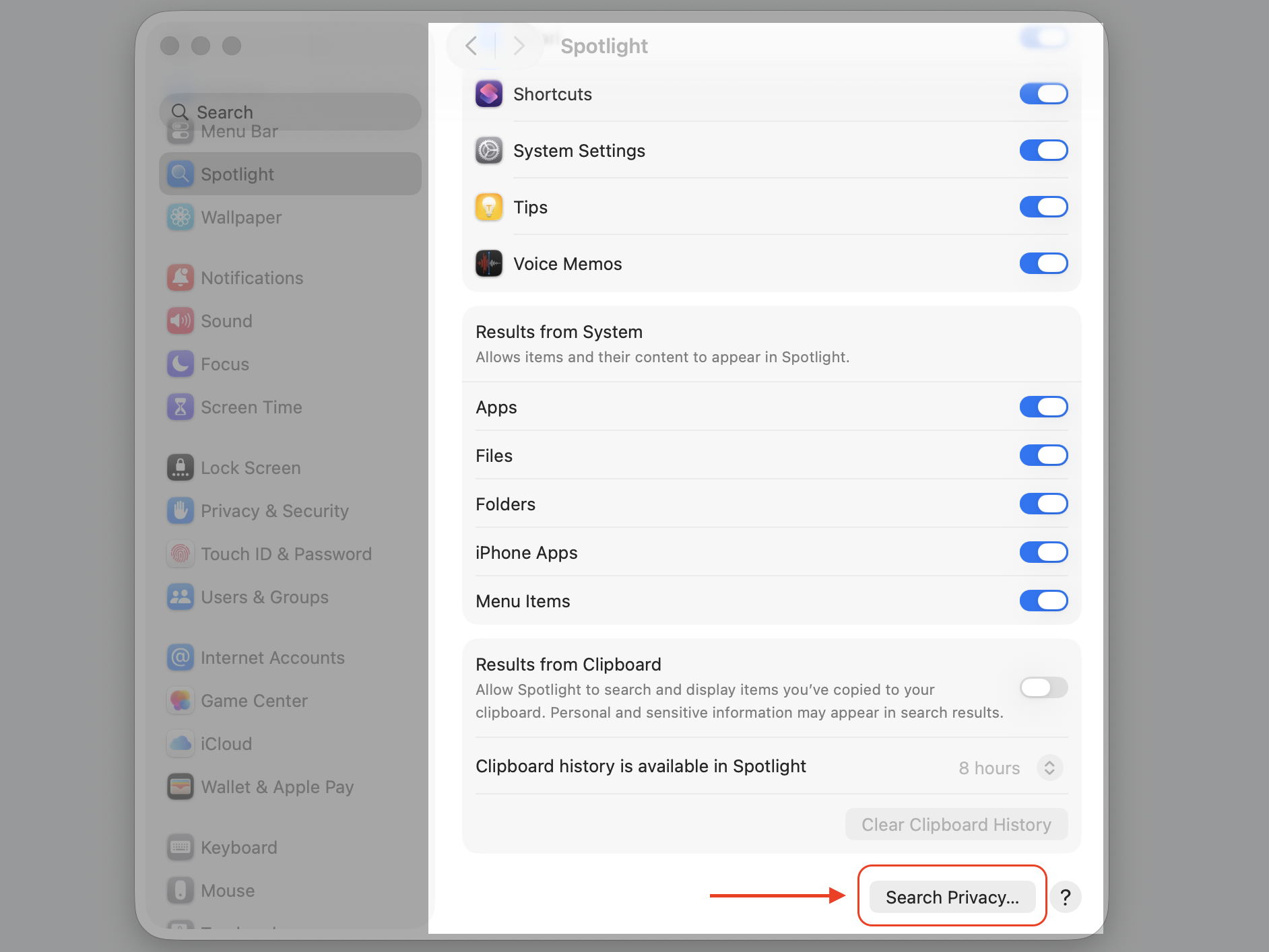 Spotlight pane in macOS Tahoe System Settings on a Mac scrolled down to reveal the Search Privacy option for excluding folders.