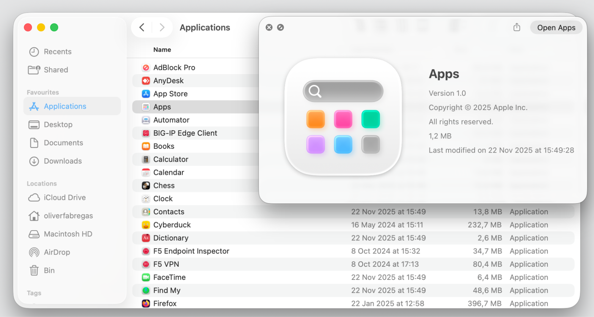 The new Apps window inside Spotlight on macOS Tahoe that replaces Launchpad, showing every app in an alphabetical list on a Mac.
