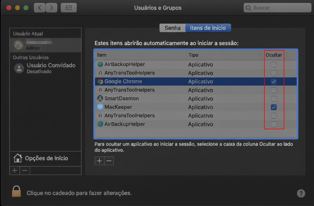 A aba Itens de Início selecionada na janela Usuários e Grupos mostra a lista de aplicativos que iniciam com o sistema. Em cada linha, ao lado do nome do aplicativo, você pode encontrar a opção de ocultá-lo marcando a caixa.