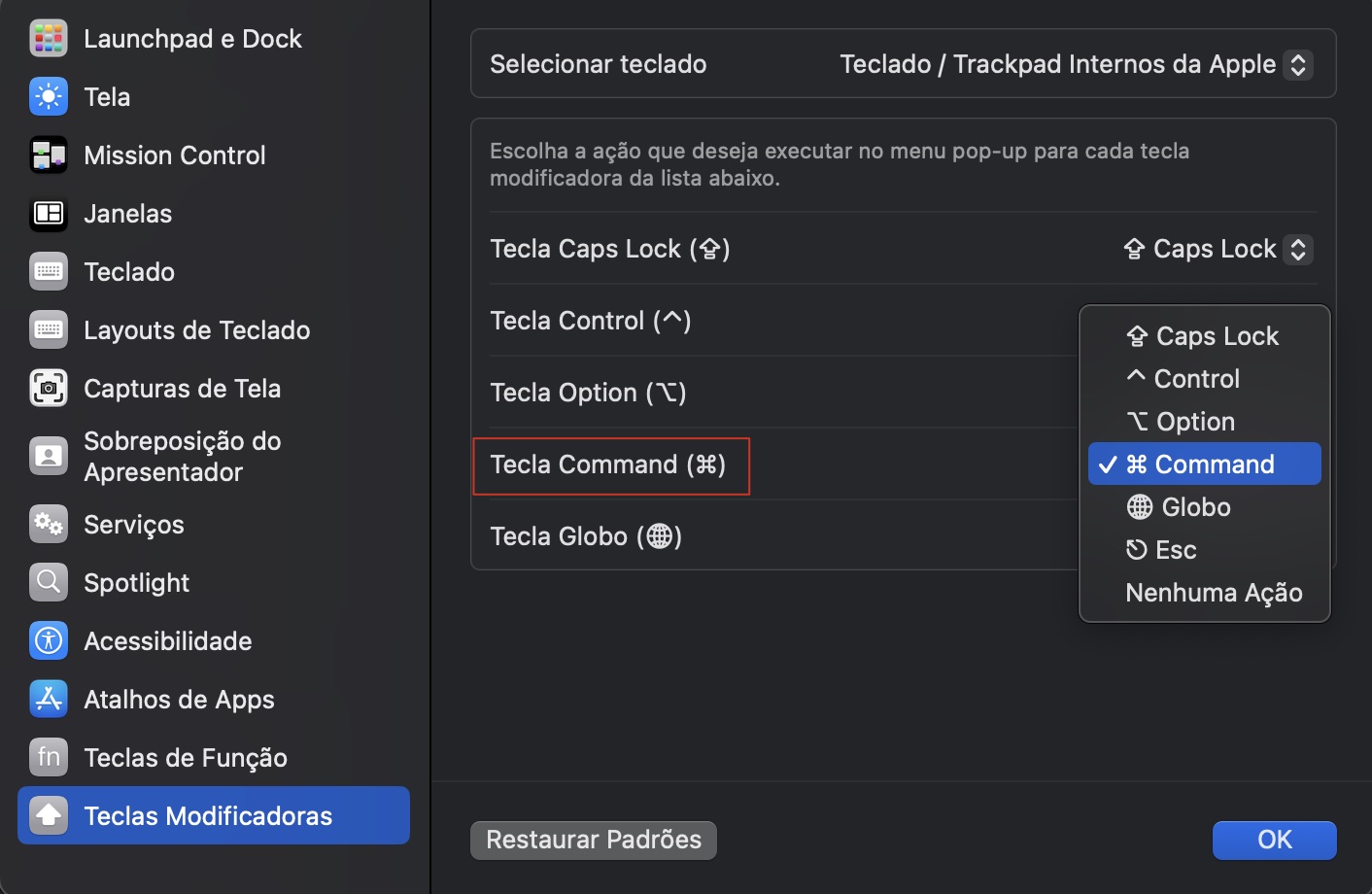 Em Teclas Modificadoras você pode escolher o que a tecla Command faz no seu Mac. Certifique-se de que ela esteja configurada para a função Command, como deve ser.