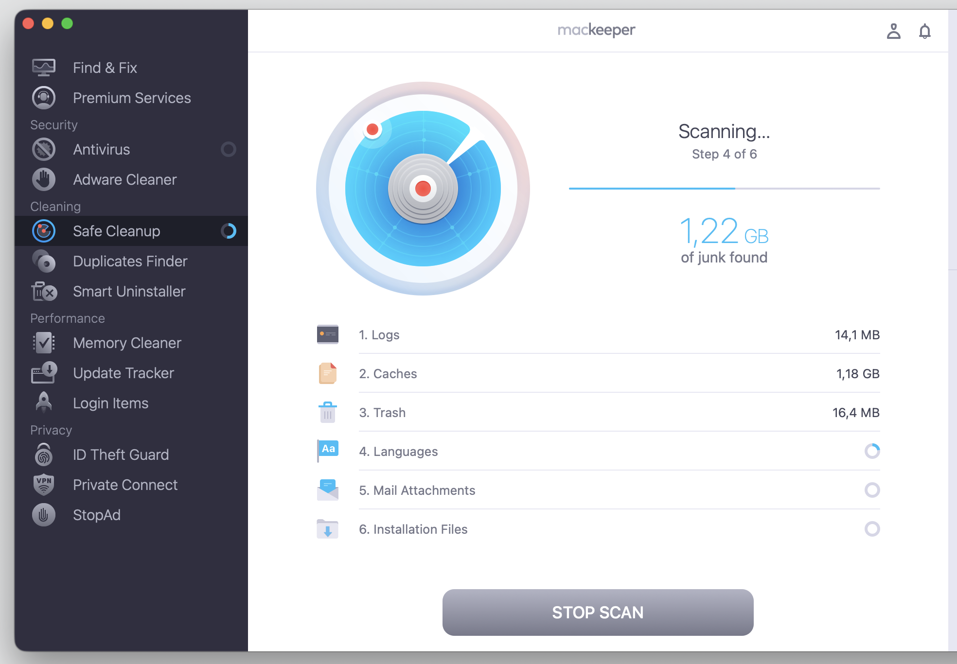 MacKeeper's Safe Cleanup scanning screen on a MacBook, displaying 1.22 GB of junk found while the disk full Apple Music scan finishes running.