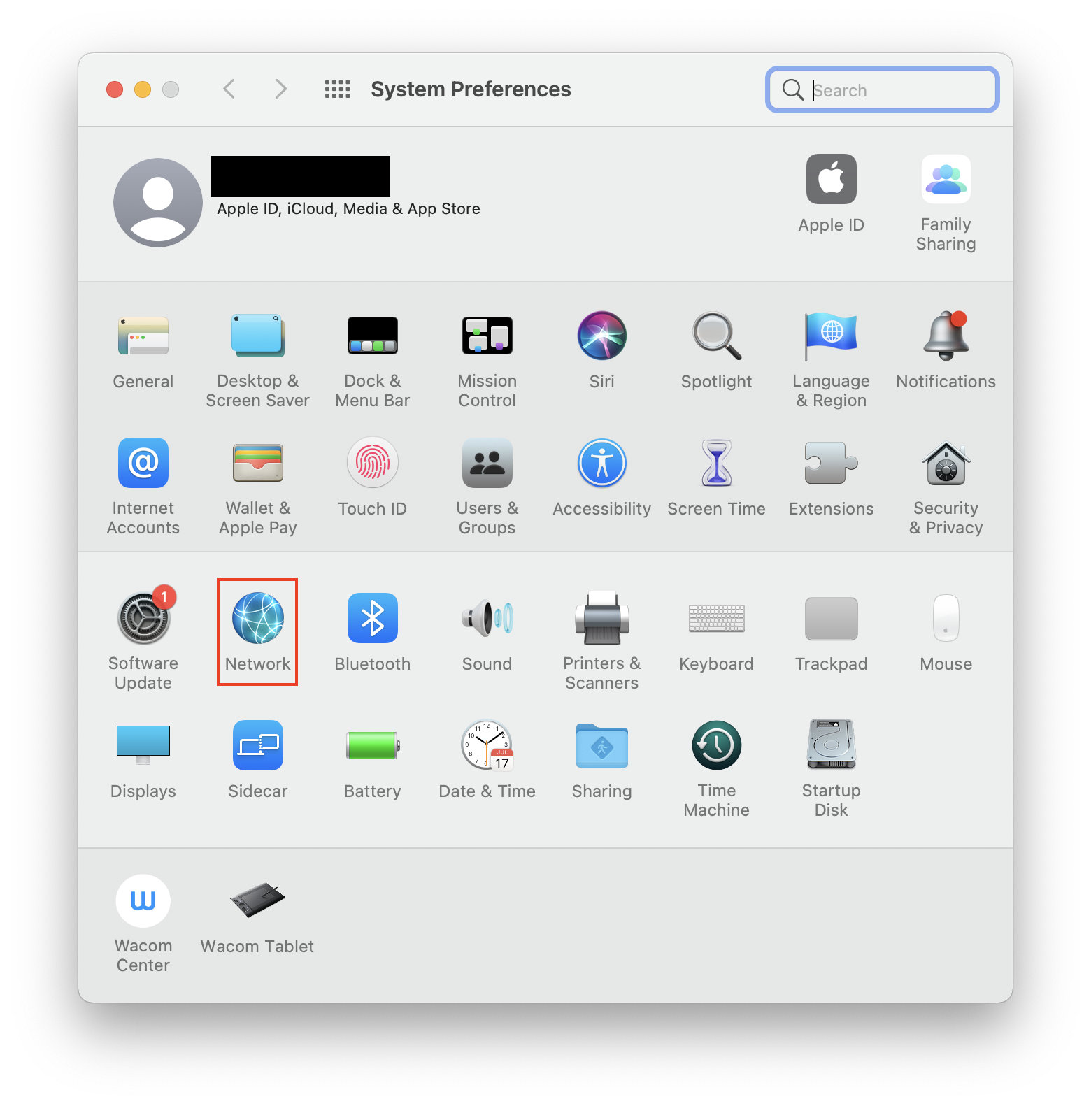 The System Preferences screen on a Mac, with Network highlighted. Part of instructions on how to restore Safari bookmarks on a Mac.