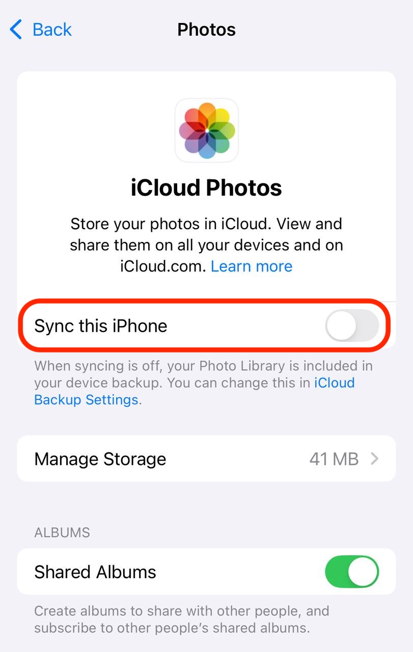 Switch off Sync this iPhone in the iCloud Photos settings to stop automatic syncing and keep photos stored locally on your device.