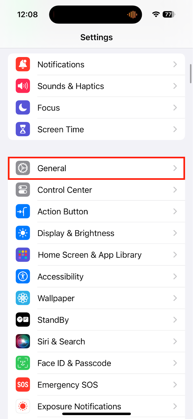 The Settings app on iPhone displaying a list of system options. Select General to factory reset your device.