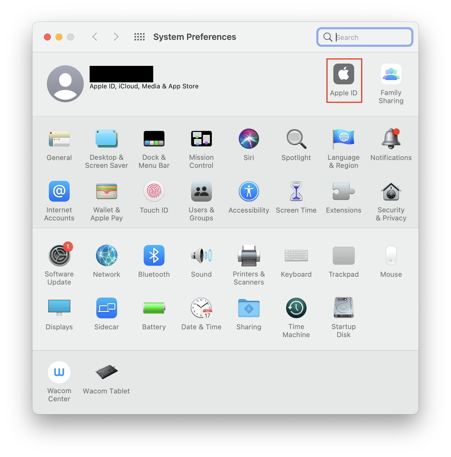 The System Preferences screen, with Apple ID highlighted. Part of instructions on how to restore Safari bookmarks on a Mac.