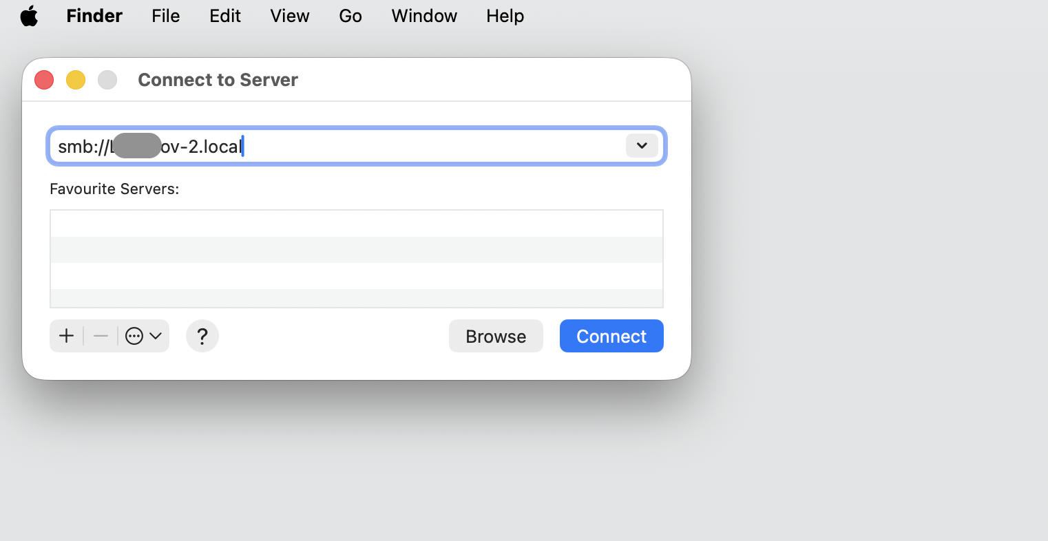 The Connect to Server window in Finder, where you type smb:// followed by the shared Mac's IP address and click Connect on macOS.