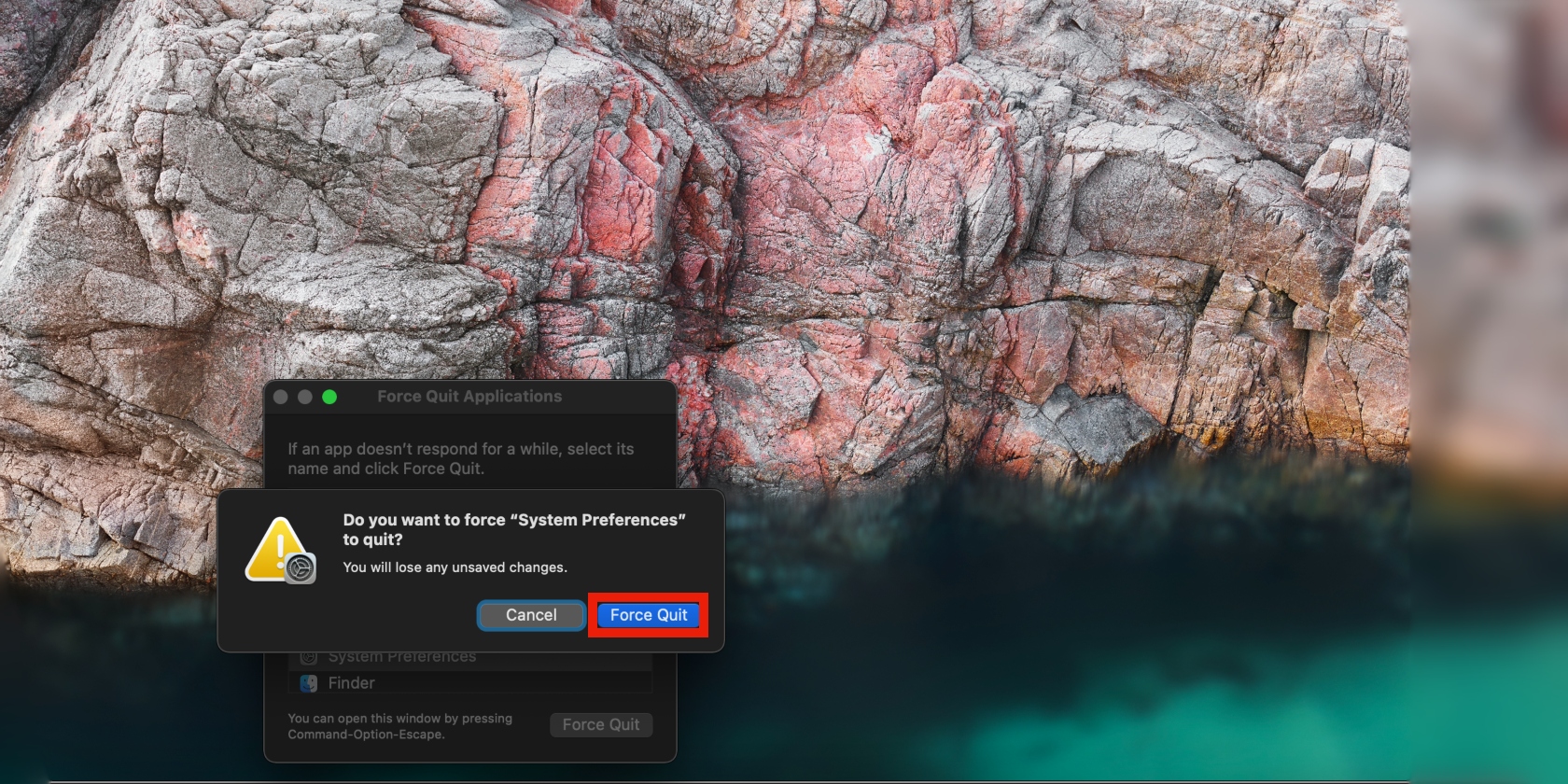 The Force Quit Applications window is opened on a Mac. Click Force Quit to close all open files and apps via the Apple menu in the menu bar.