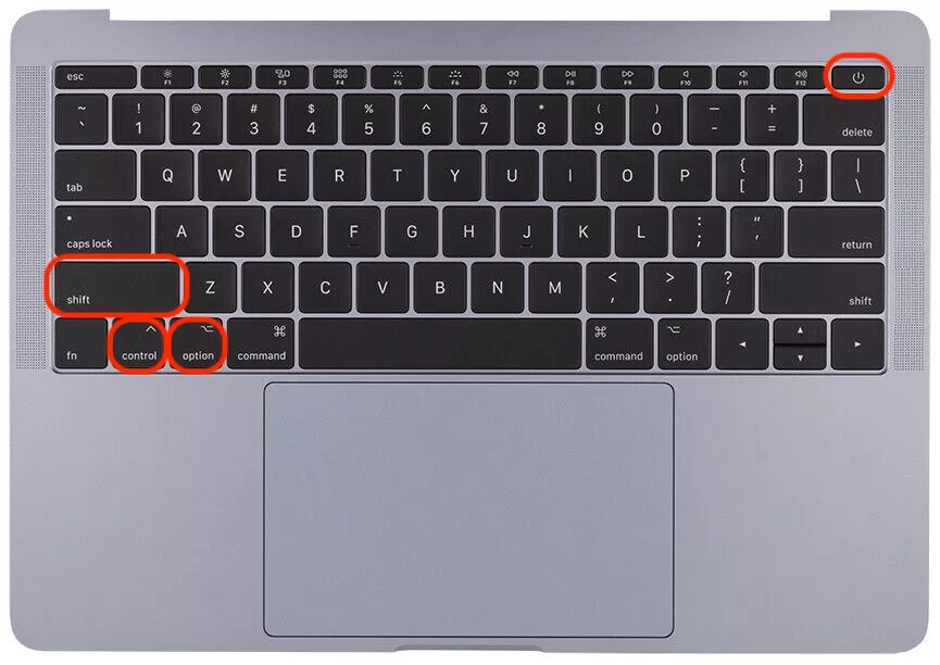 Press and hold the Shift, Control, and Option keys alongside the Power button on your Mac keyboard to initiate a full SMC reset.