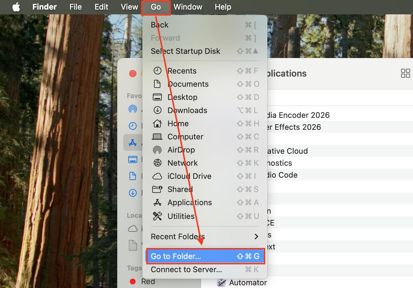 macOS Finder menu bar with the Go menu open on an Apple laptop, highlighting the Go to Folder option to navigate to the After Effects cache directory.