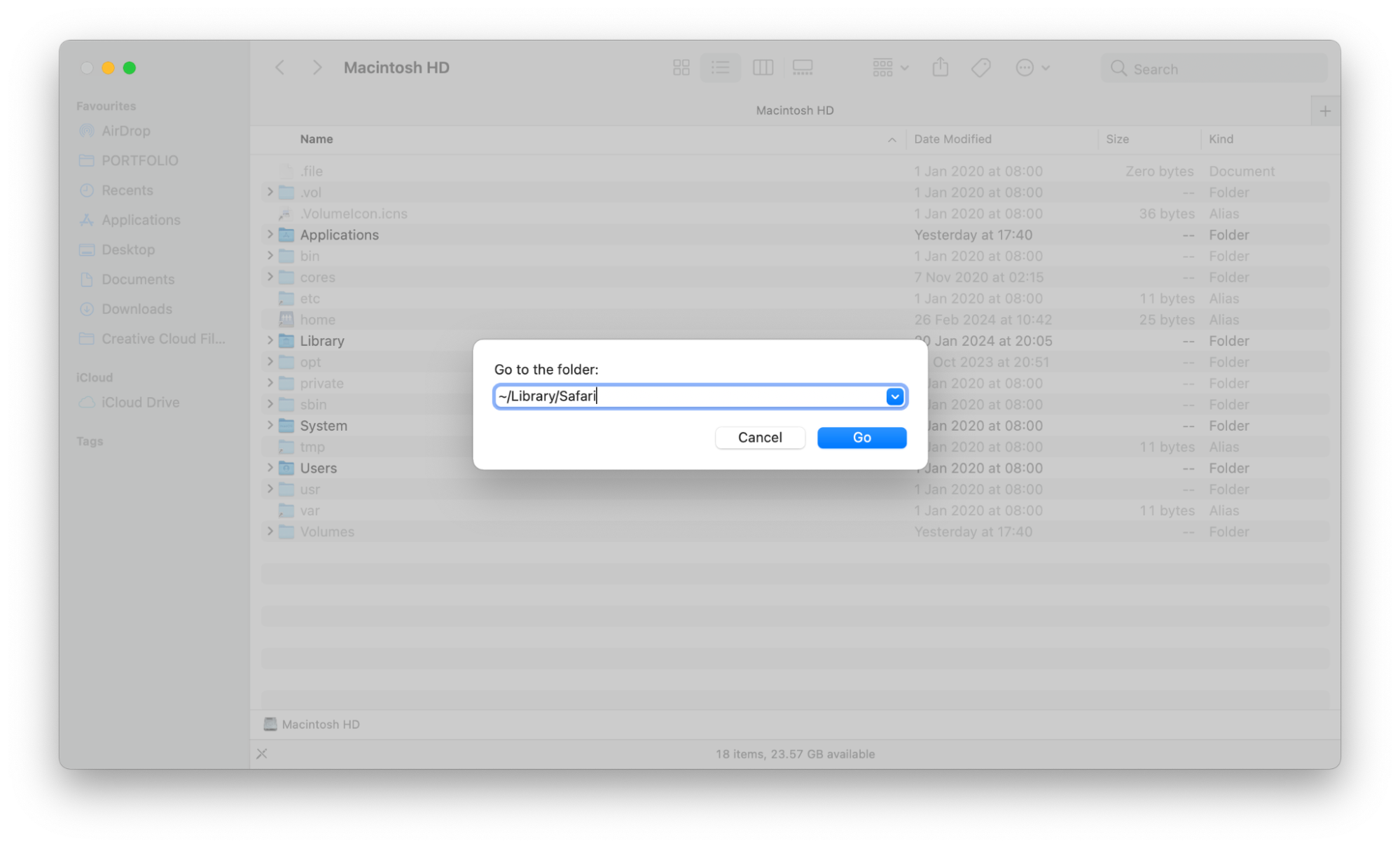 The Go to Folder dialog box in Finder. Part of instructions on how to restore Safari bookmarks on a Mac.