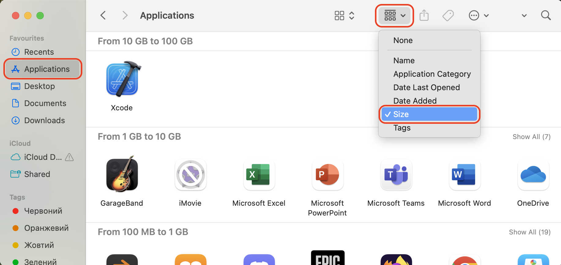 In Finder, open the Applications folder, switch to list view under the View menu, and sort items by Size to identify large apps.