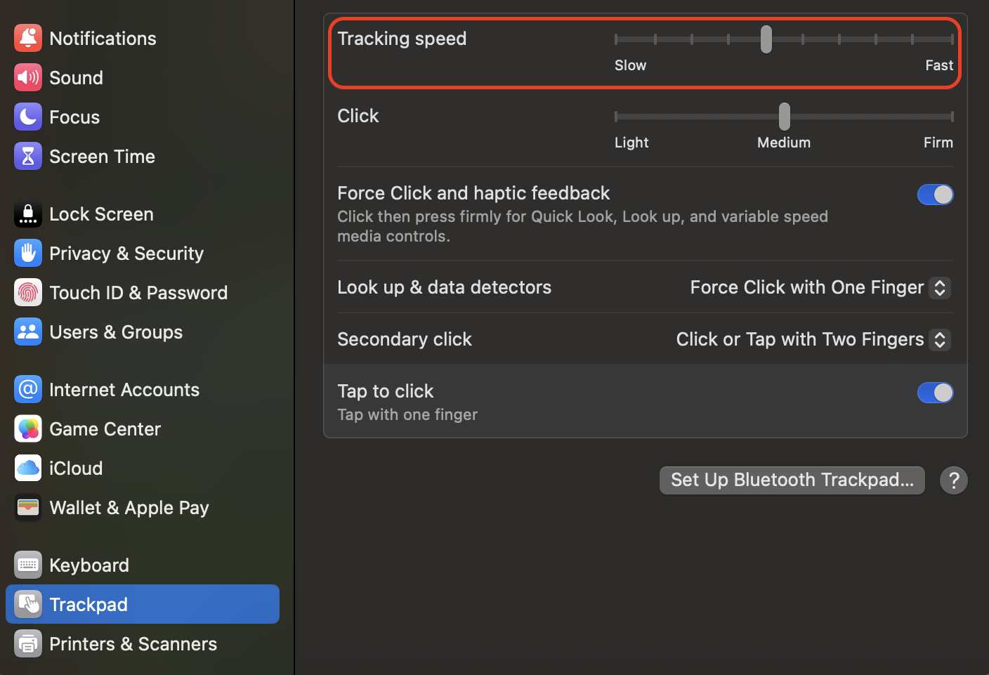 Modify the Tracking Speed slider in Trackpad settings to change how quickly the pointer moves, allowing smoother and more precise left-click control on your Mac.