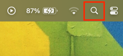 To force quit an unresponsive Finder on Mac, click the magnifying glass icon to open the macOS Spotlight feature.