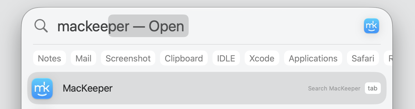 Spotlight Search on macOS with an app name typed into the bar, ready to hit Enter to open a Mac app that won't launch normally.