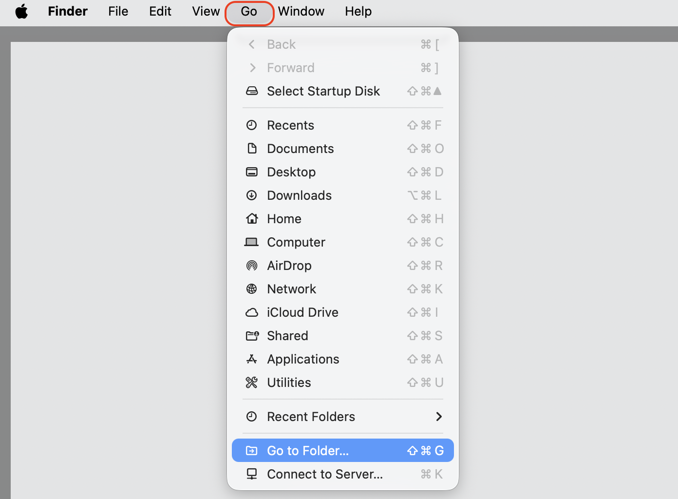 Finder Go menu open in the macOS menu bar with Go to Folder highlighted, the first step to open the opt folder on your Mac.