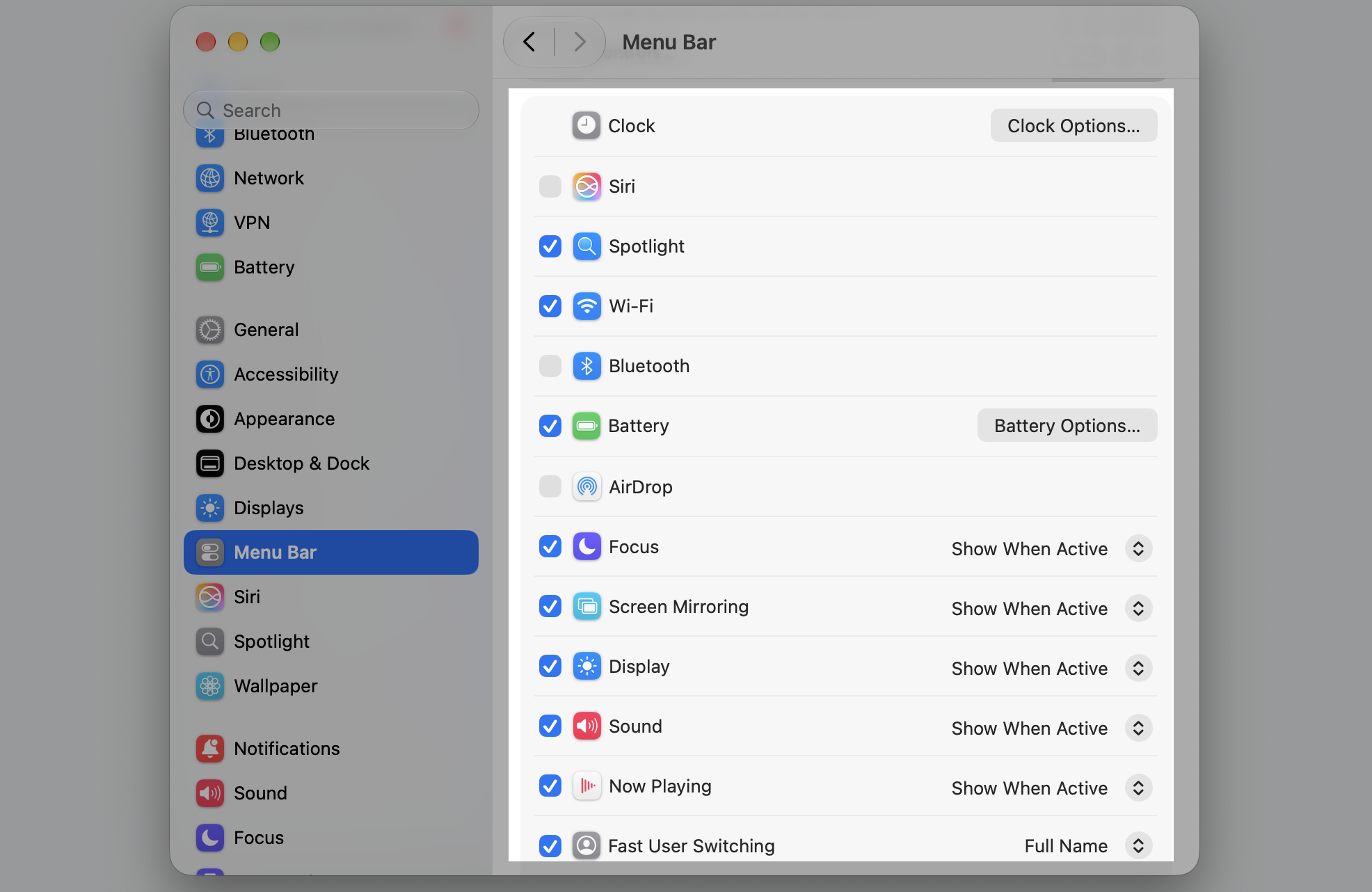 Menu Bar tab in macOS System Settings listing controls like Spotlight, Wi-Fi, Battery, and Focus you can toggle for the menu bar on a Mac.