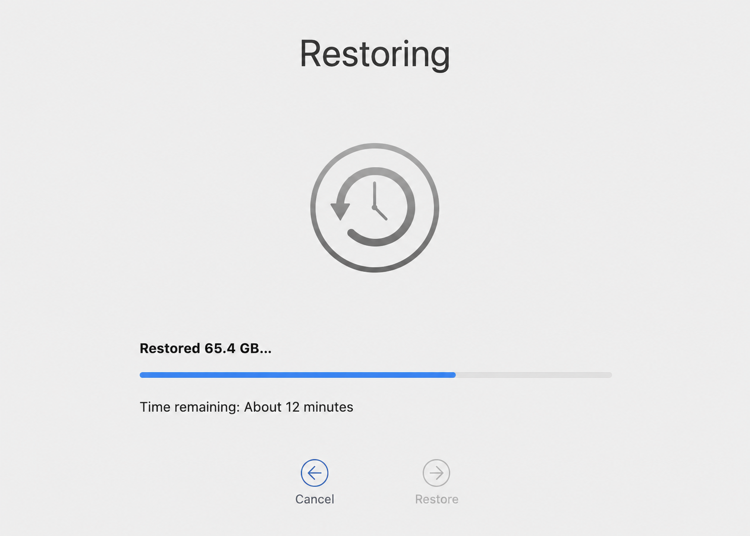 Restoring progress screen in macOS Recovery on a MacBook showing gigabytes restored and time remaining for the Ventura rollback.