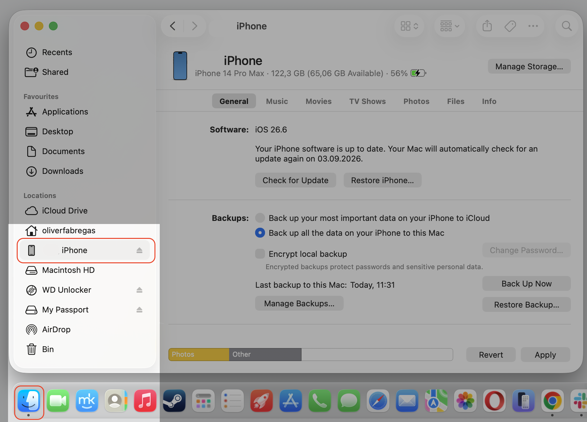 Finder on macOS with a connected iPhone selected in the sidebar and its General tab open to check iPhone sync data using disk space on Mac.