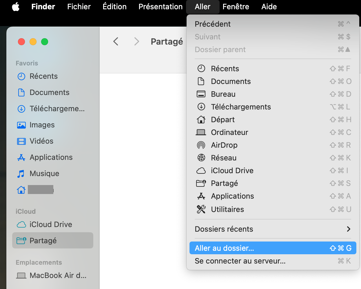 Une partie d'une fenêtre du Finder sur Mac. Le menu Aller est ouvert et l’onglet Aller au dossier est mis en évidence. Étape un du guide pour vider les caches Mail sur Mac manuellement.