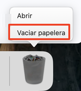 Parte del Dock en un Mac, con la Papelera seleccionada. El menú contextual está abierto y Vaciar Papelera está seleccionado. Cómo eliminar el caché de mail en Mac.