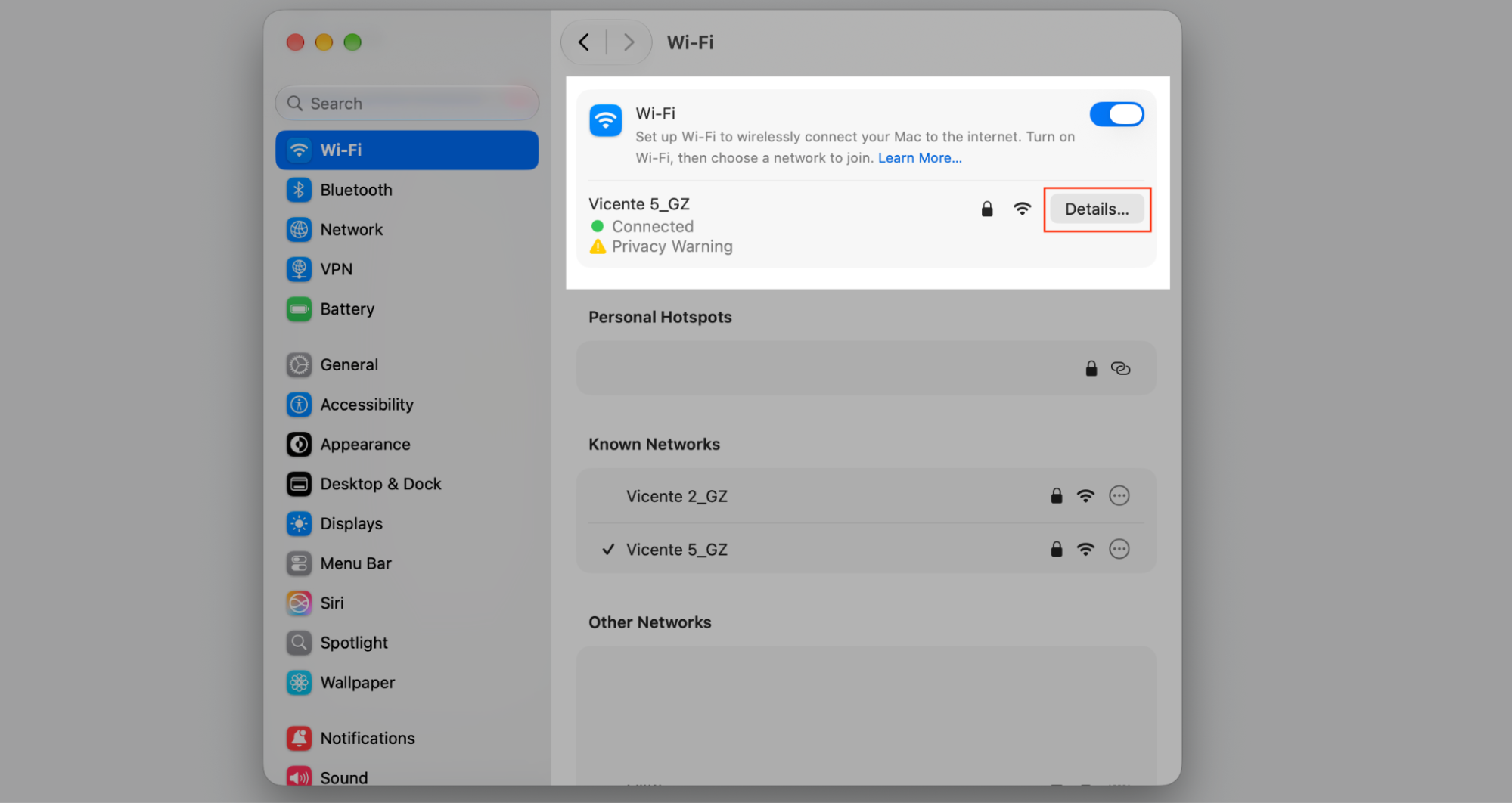 Wi-Fi pane in macOS System Settings with the Details button highlighted beside the connected network to open advanced options on a Mac.