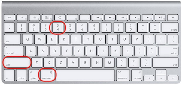 Apple wireless keyboard highlighting the Shift, Command, and 4 keys, the macOS shortcut to capture a selected screen area on Mac.