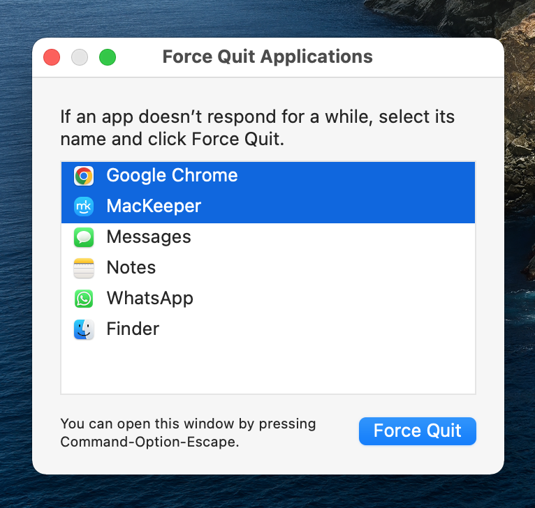 The Force Quit Applications window is opened on a Mac. Click Firce Quit to close all open files and apps via the Apple menu in the menu bar.