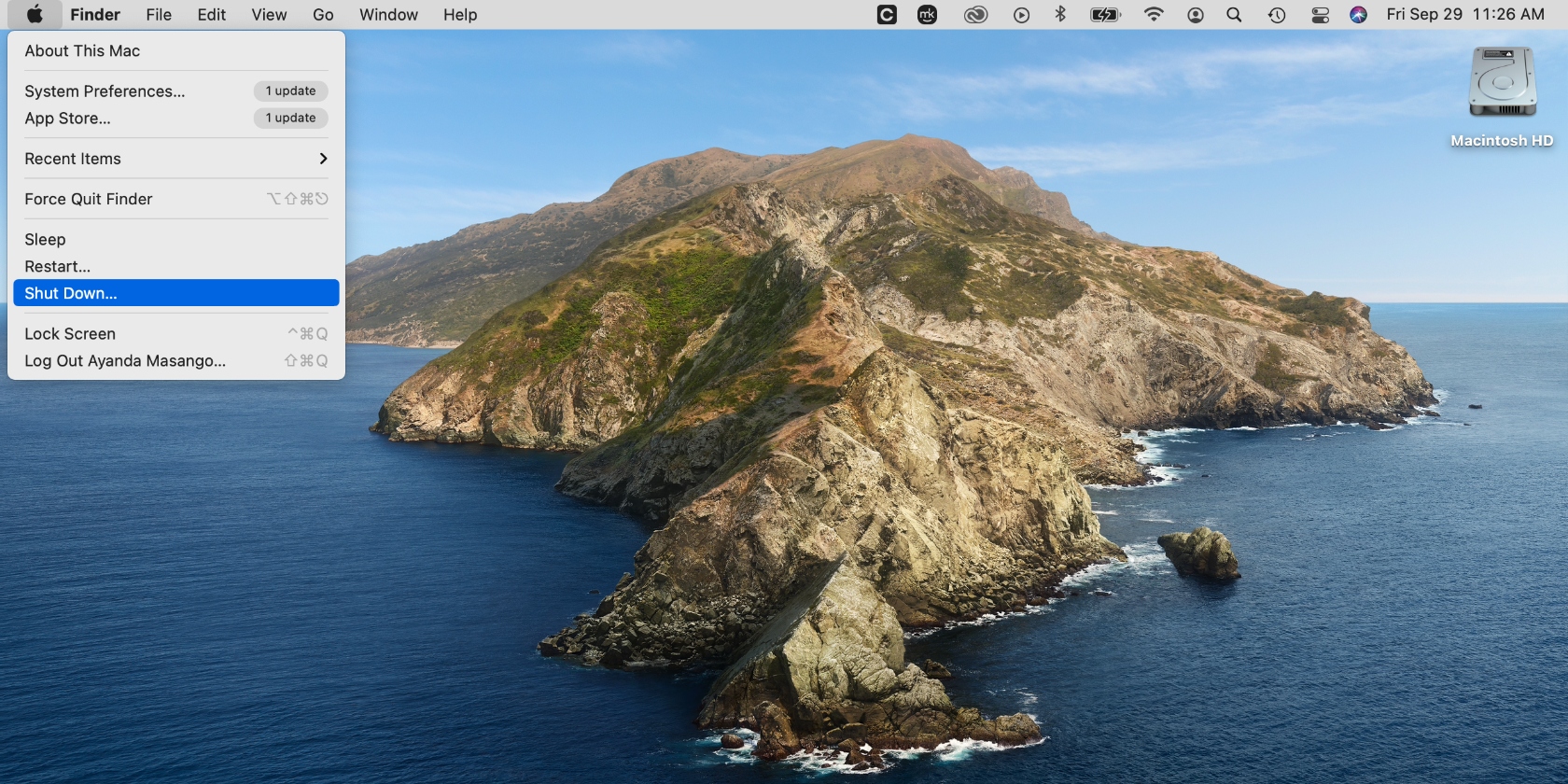 The Apple menu is opened on a Mac. Choose the Shut Down option to reset NVRAM/PRAM settings on your device and fix the startup disk error.