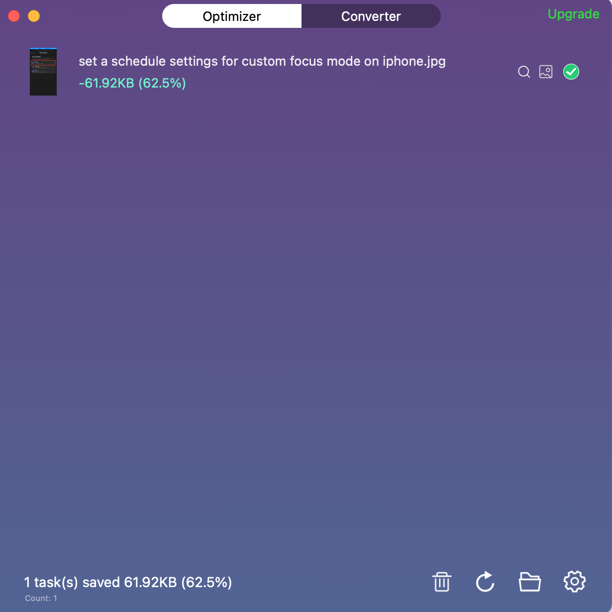 The Image Optimizer Compression App is opened on a MacBook. Use it to compress JPEG files from your computer and automatically save them.