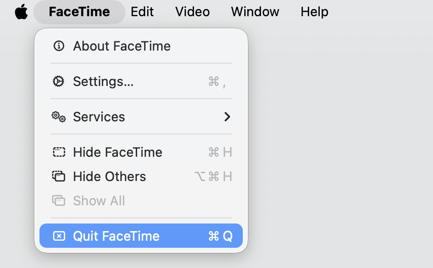 FaceTime app menu on an Apple computer showing the Quit option next to the Apple logo to restart the FaceTime service tied to identityservicesd.