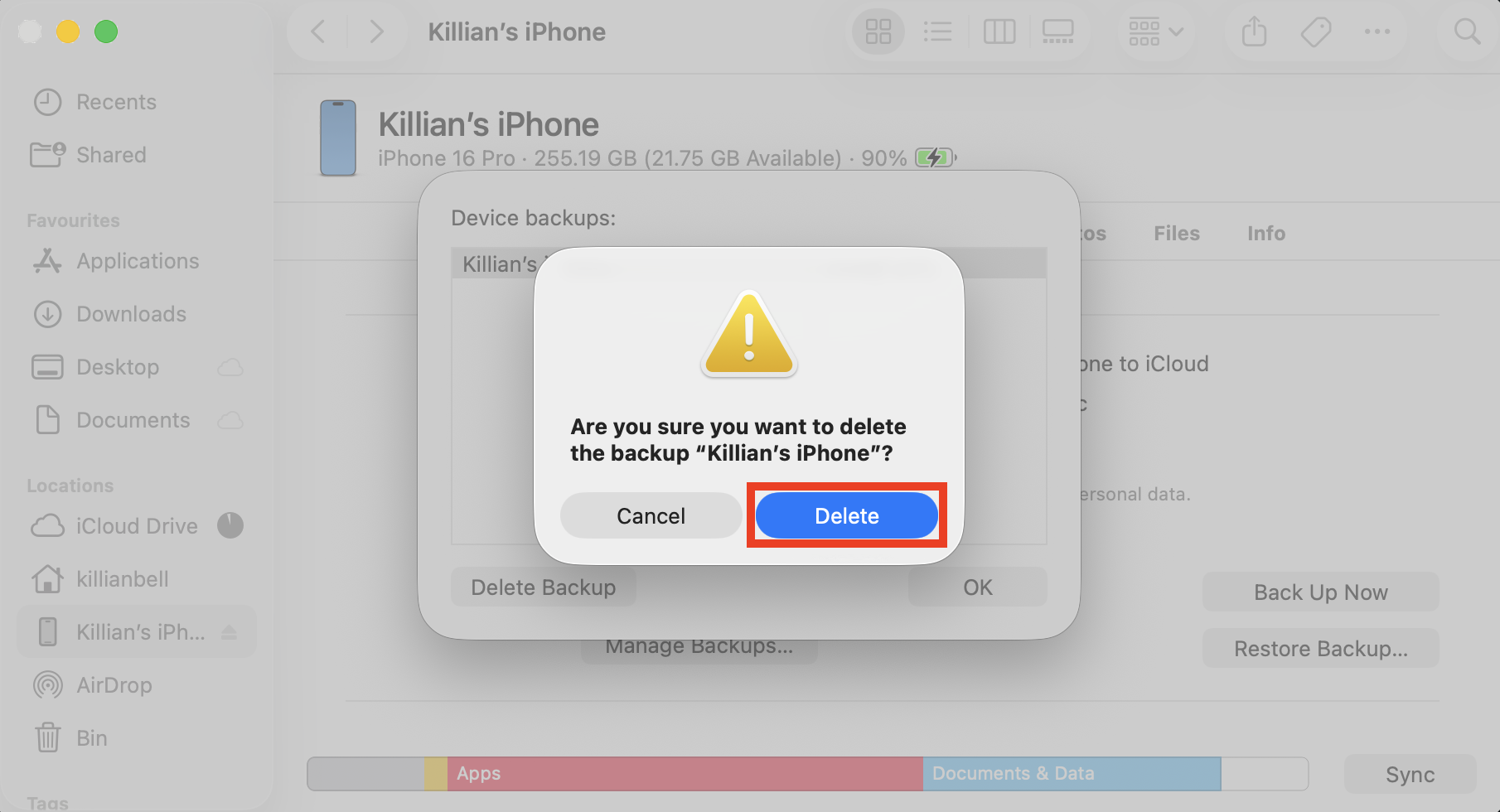 A confirmation prompt for deleting an iOS backup on Mac. If you find iOS files are taking up too much space on your Mac, remove them from within Finder to free up storage.