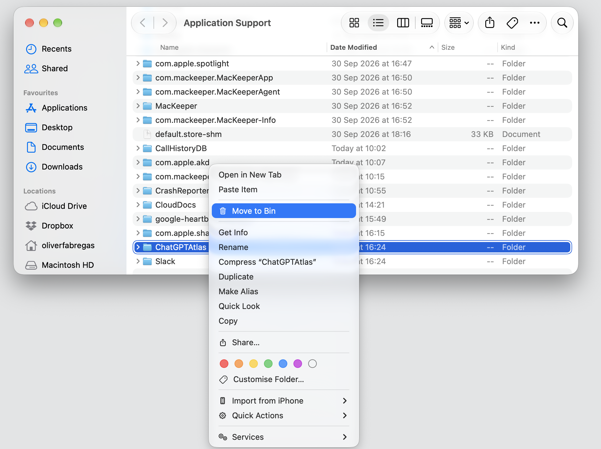 The Application Support folder in Finder on an iMac, with a ChatGPTAtlas folder right-clicked and Move to Bin ready to delete it.