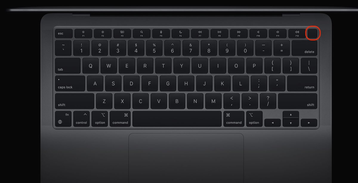 A mockup of a Mac keyboard. Press and hold the power button until loading startup options appears on the screen to use Disk Utility in Recovery Mode.