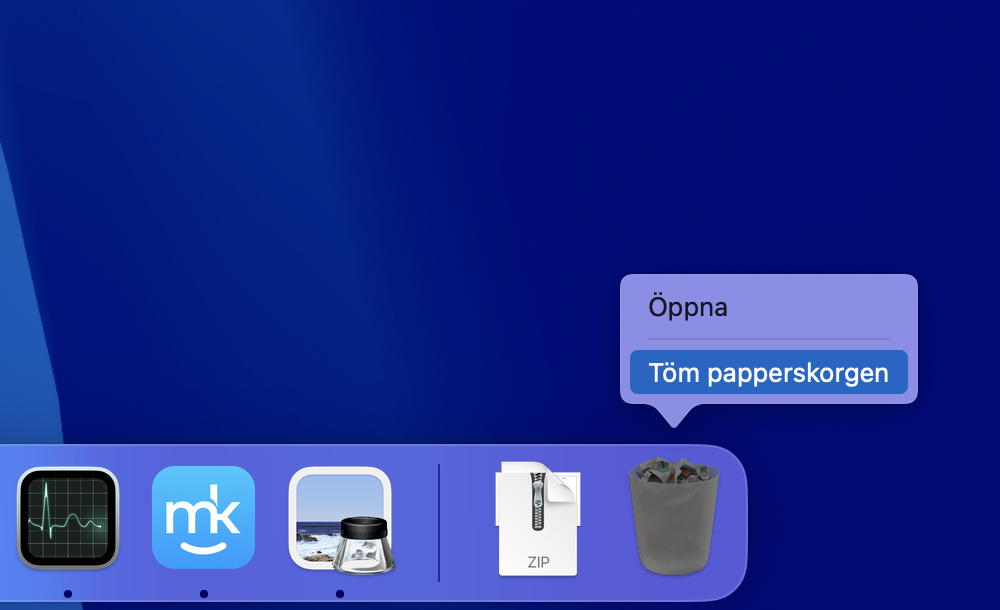 Snabbmenyn som visas när man högerklickar på papperskorgen i Dock på Mac.Klicka på Töm papperskorgen för att avinstallera programmet.