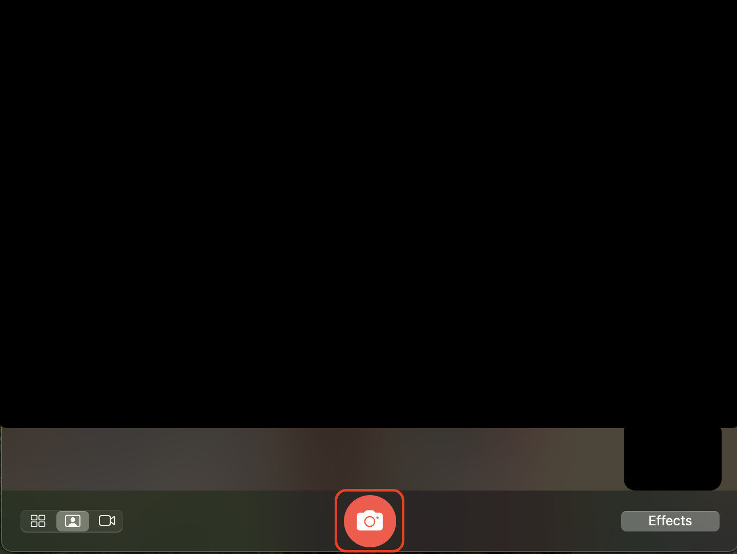 Click the red camera button to initiate a three-second timer before the built-in webcam captures your photo in the Photo Booth app.