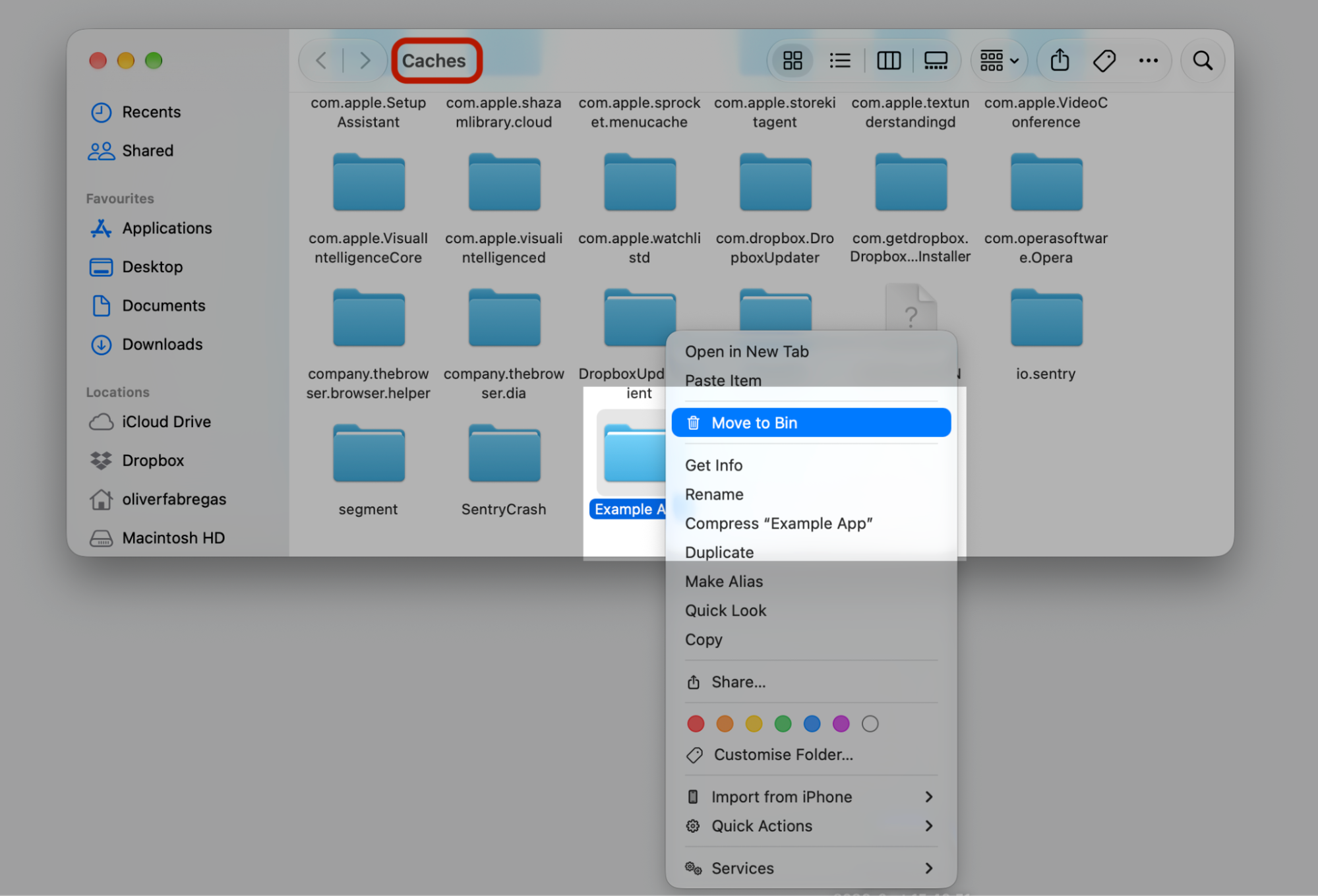 The Library Caches folder on macOS with an app's cache folder Control-clicked to move it to the Bin when apps won't open.